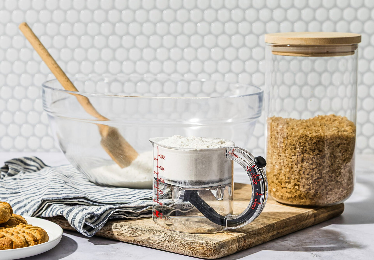 Upcup is a 4-in-1 adjustable measuring cup that scrapes itself clean for wet, dry, and sticky ingredients.