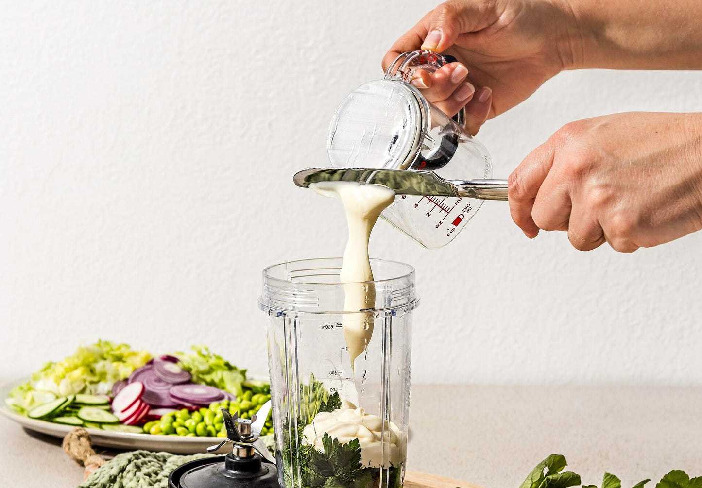 Upcup is a 4-in-1 adjustable measuring cup that scrapes itself clean for wet, dry, and sticky ingredients.